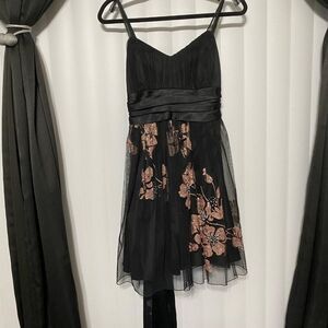 Trixxi black with bottom as rose gold with sparkly floral dress